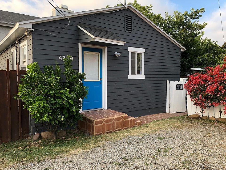 Welcome Home! Here is an orange tree by your kitchen door