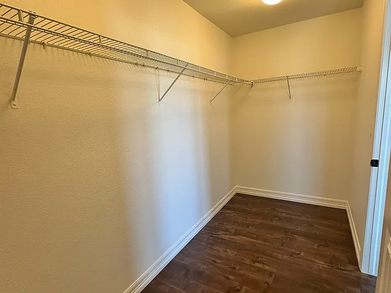 primary bedroom walk-in closet