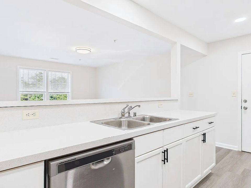 Cabinets and the dishwasher are new and in excellent condition with two sink.