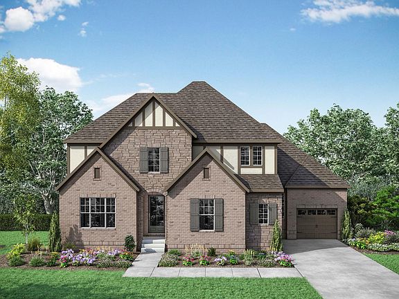 new home with brick, stucco and stone