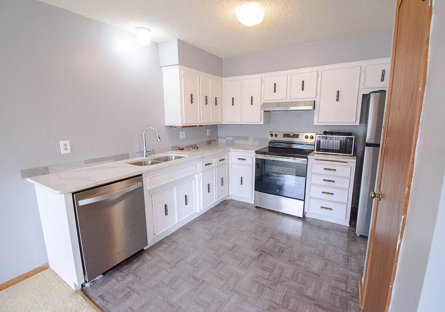 2BR Twin Home with Garage & Great Outdoor Space! — Photo 2