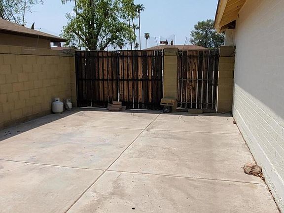 Behind the gate slab parking.