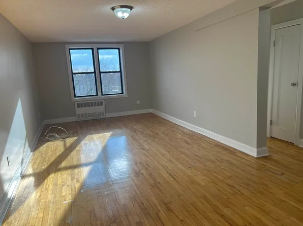 122-04 Metropolitan Avenue image 1 of 18