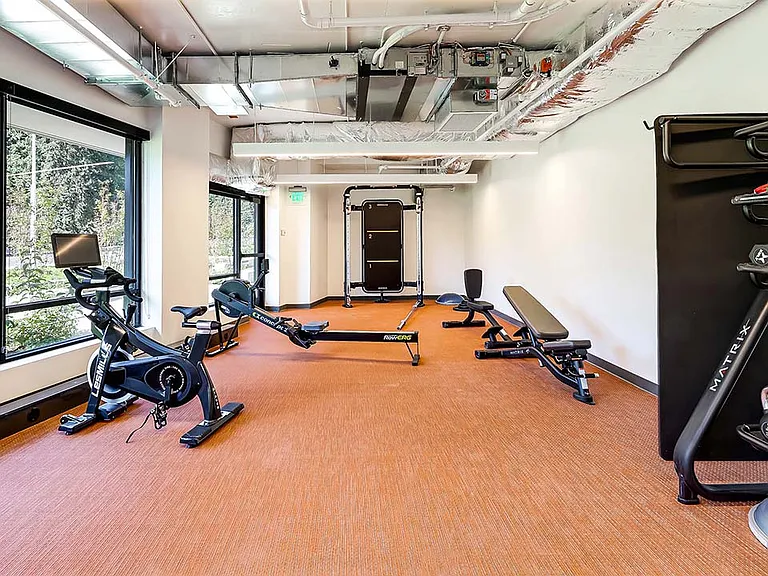 Griffis Shoreline fitness center with cardio machines and weight equipment.