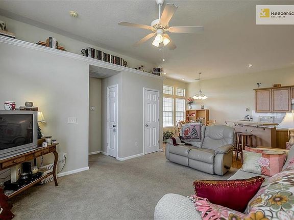 Living room looking into the kitchen and dining area. Ten foot ceilings give an open feel to the layout.