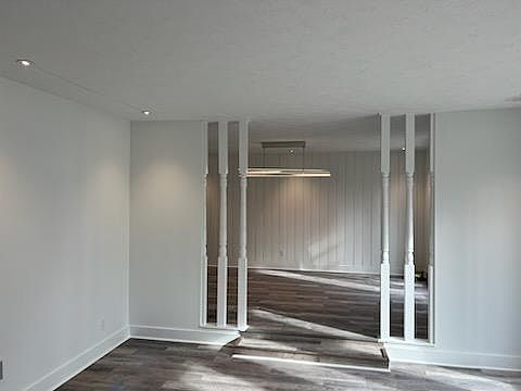 view from entrance to sitting room and then dining room