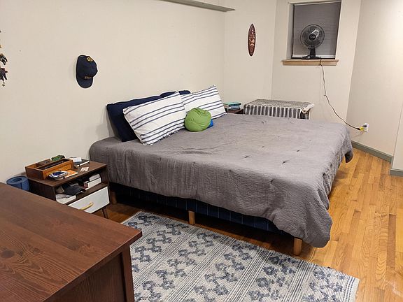 Front Bedroom shown with Queen sized bed & dresser