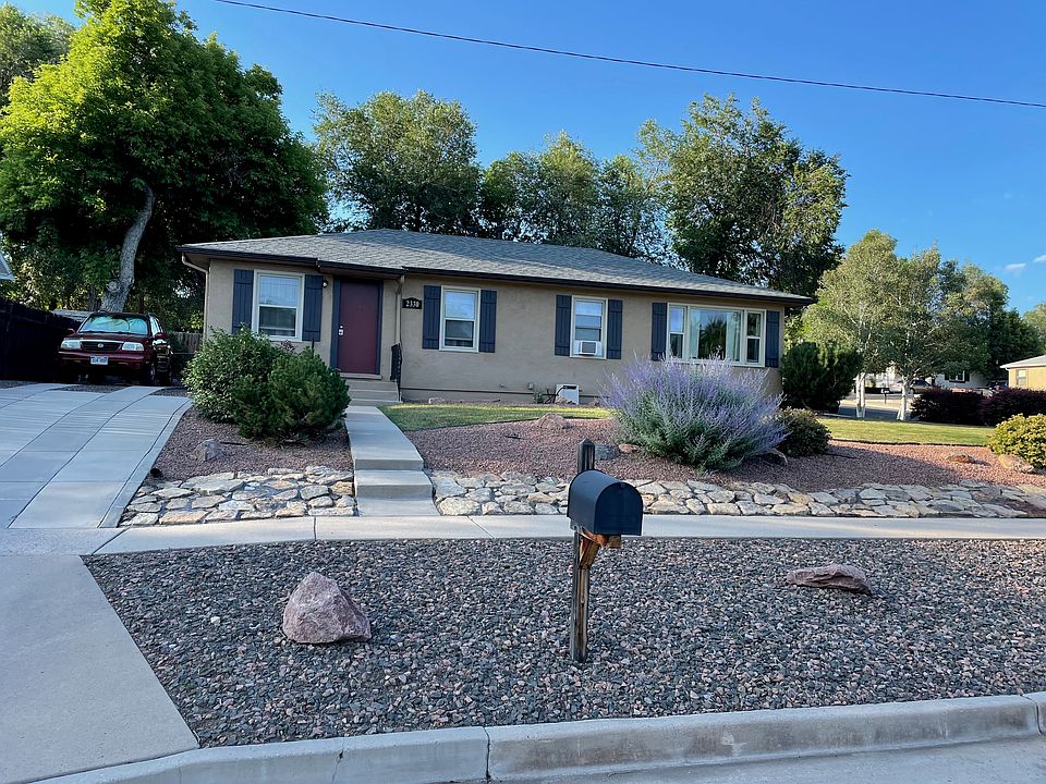 2330 E Yampa St. Private off street parking. Lovely manicured landscaping.