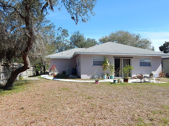 open backyard, part fenced