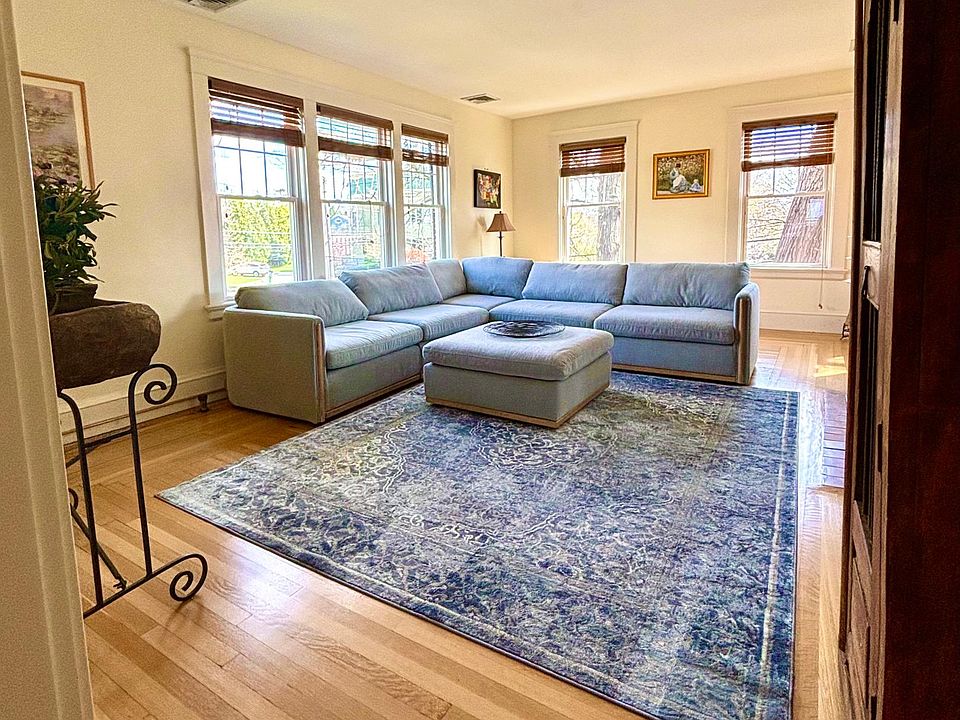 Spacious living room with fireplace.