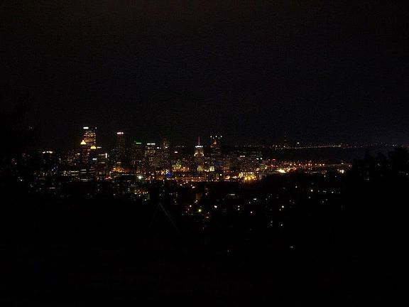 Nighttime city view from the deck