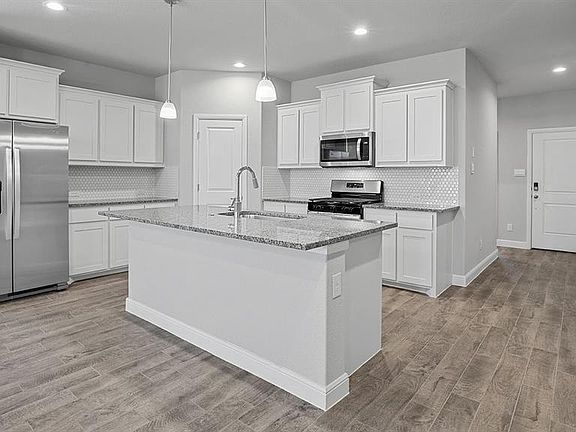 Kitchen - All Home and community information, including pricing, included features, terms, availability and amenities, are subject to change at any time without notice or obligation. All Drawings, pictures, photographs, video, square footages, floor plans, elevations, features, colors and sizes are approximate for illustration purposes only and will vary from the homes as built.