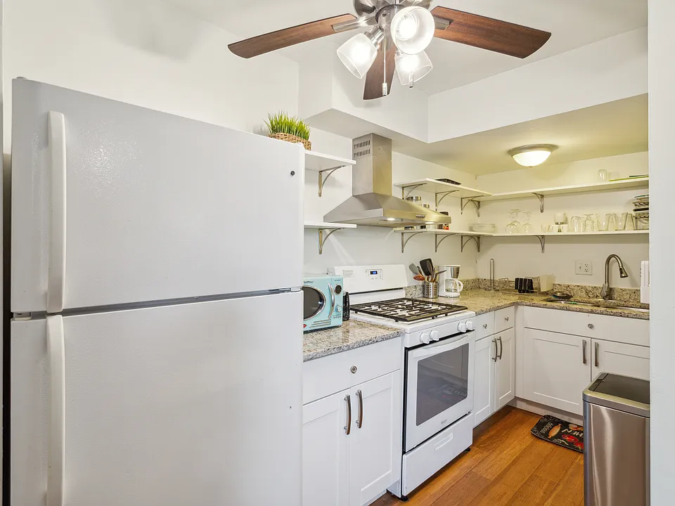 Move into a fully modernized cooking space featuring elegant granite countertops, ample cabinetry, and full-sized appliances_including a refrigerator, stove, oven, and microwave. Enjoy total independence with no shared appliances or food prep zones.