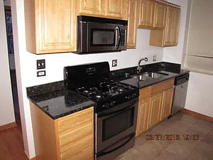 Building Photo - 4910 N Spaulding Ave #2W