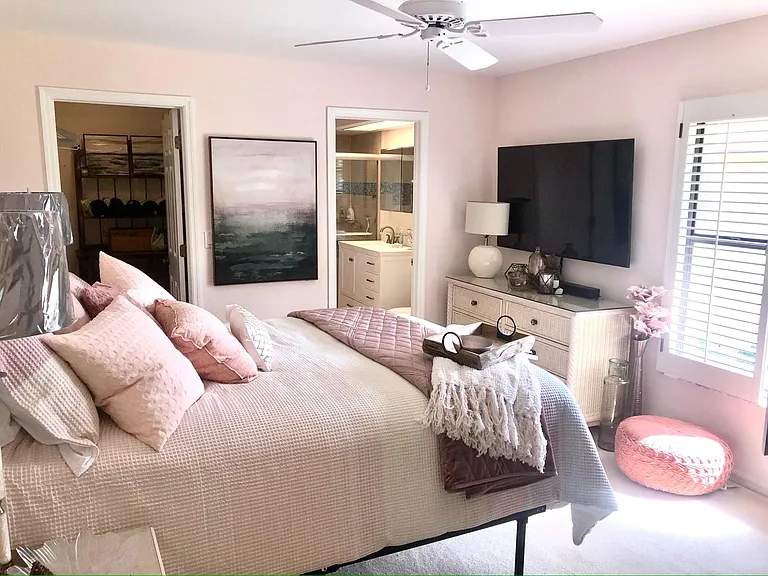 Beautiful master bedroom with South facing window -light & bright.