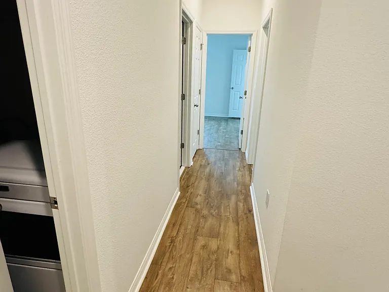 hall way to another side of bedroom