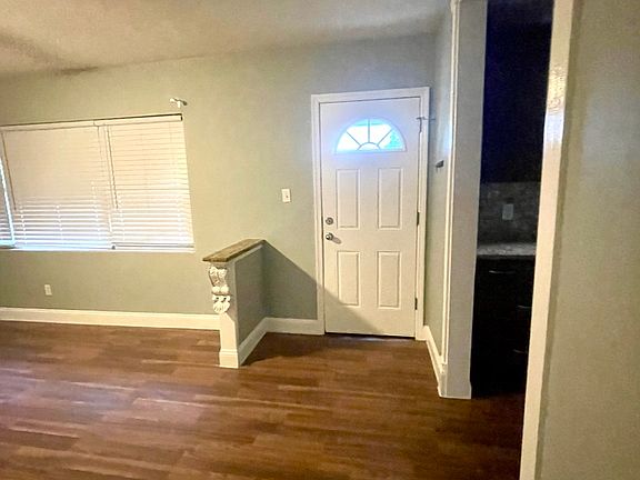 Living room adjacent to the kitchen.