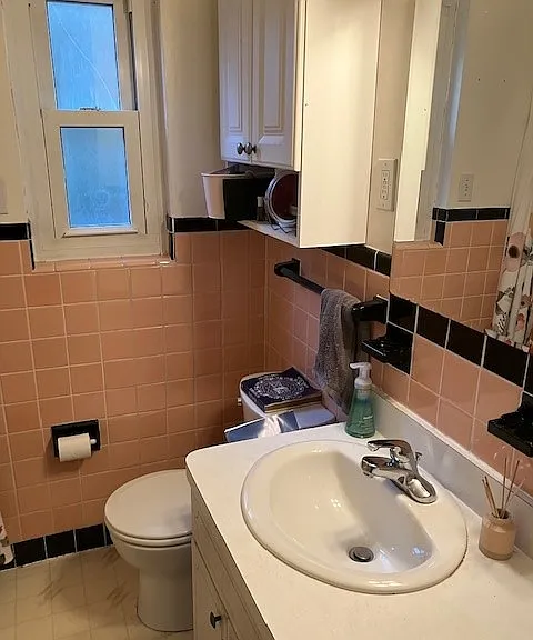 Bathroom, built in medicine cabinet/mirror, clothes shoot,
large vanity for storage