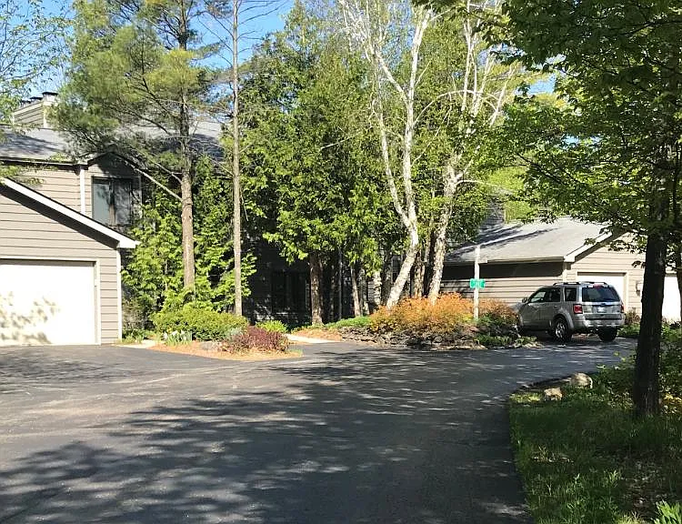 6 plex with rental unit on the 2nd floor. Private parking space is located where the silver Ford Escape is parked. The 2nd private parking space is across the street.