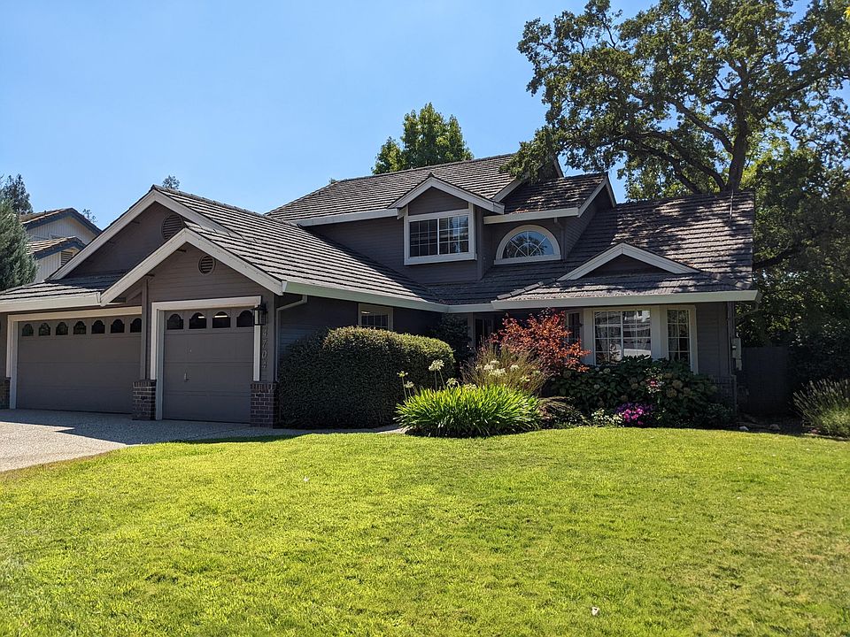 Charming exterior with large trees for shade.