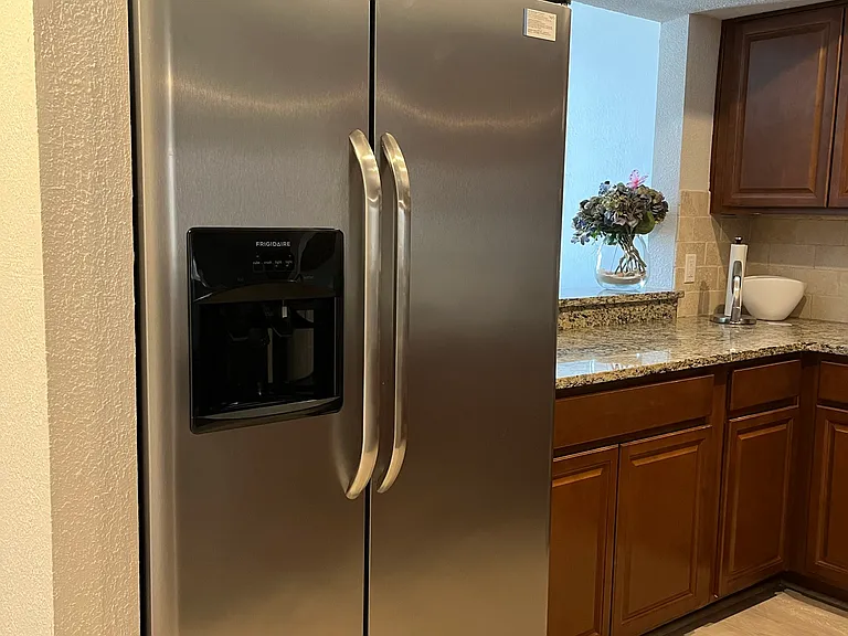 All stainless appliances, wood cabinets and granite counter tops.