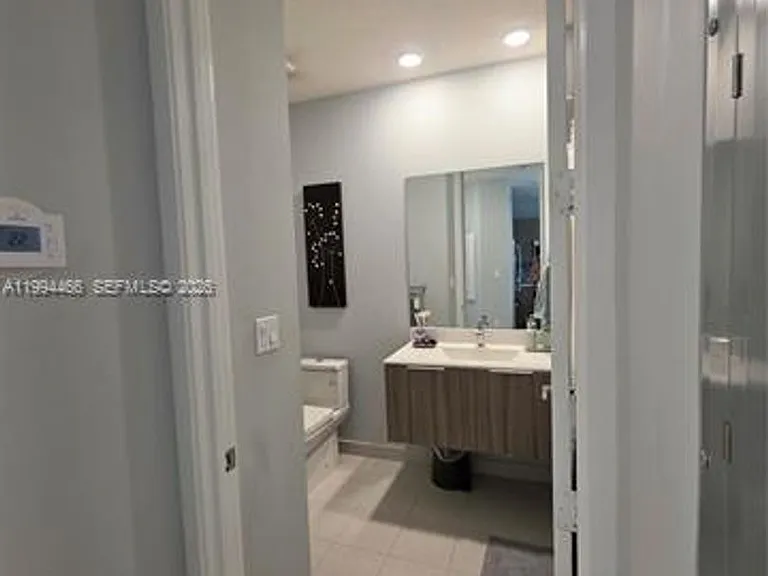 10222 NW 64th Way #302 — Photo 27