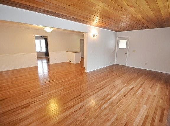 Main floor family room looking into dining room