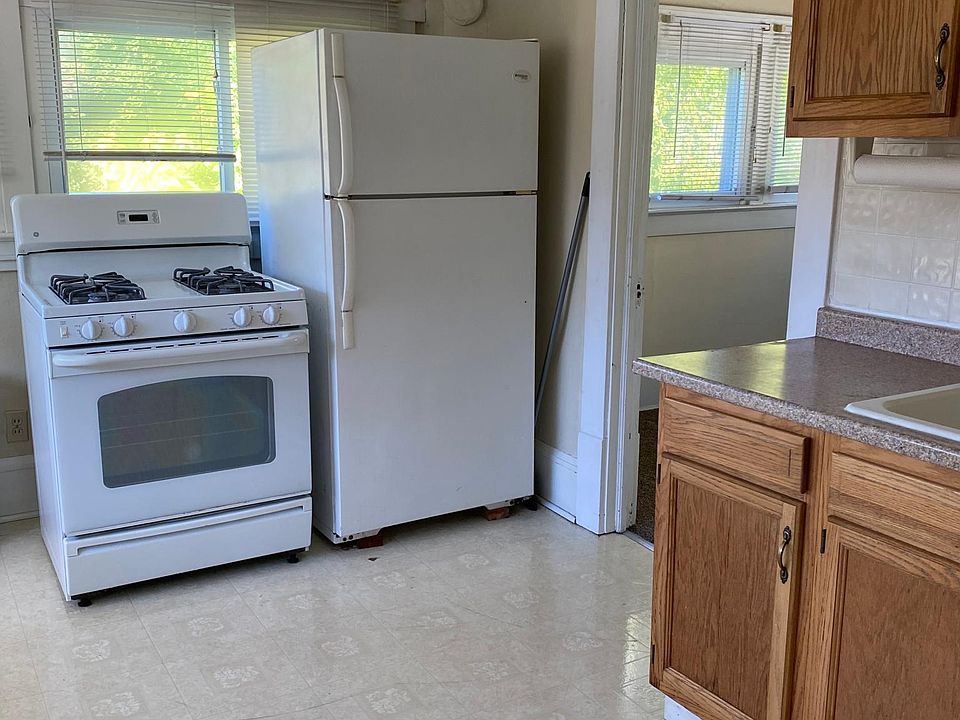 Kitchen in the back with the second bedroom off of the kitchen