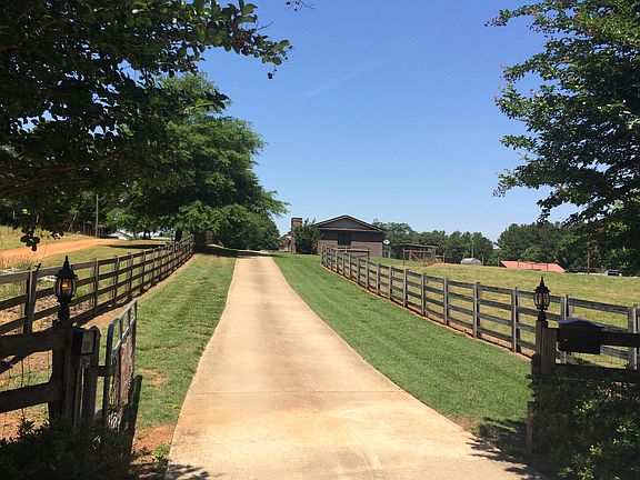 Front entry passes cottage.