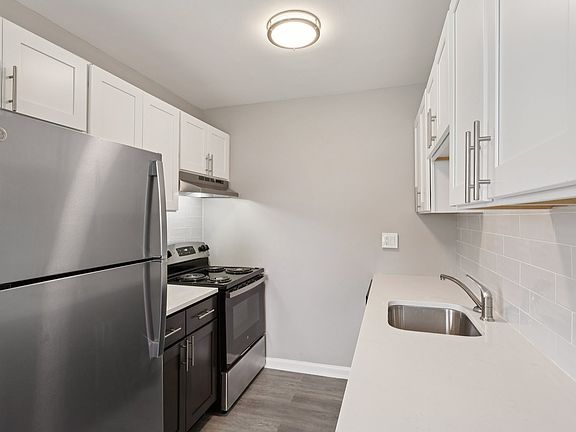Elevate your lifestyle at Mt. Vernon Apartments! This modern kitchen features sleek stainless steel appliances and ample counter space, perfect for culinary creativity. Step into comfort and convenienceschedule your tour today!