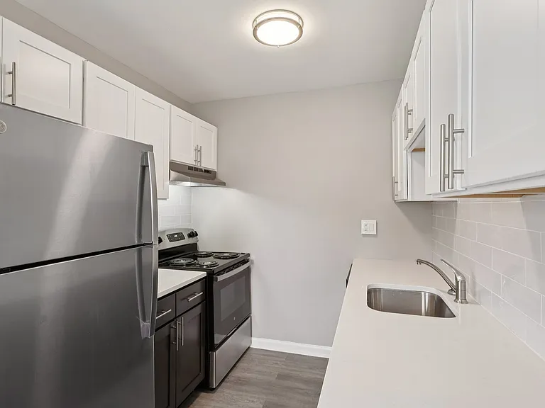 Elevate your lifestyle at Mt. Vernon Apartments! This modern kitchen features sleek stainless steel appliances and ample counter space, perfect for culinary creativity. Step into comfort and convenienceschedule your tour today!