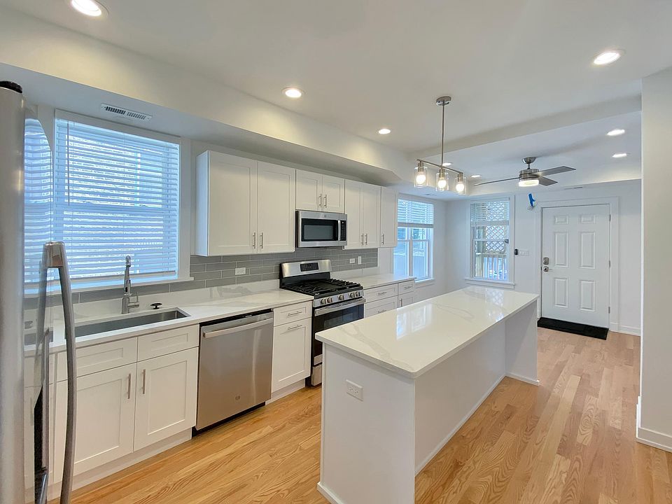 New kitchen with high end appliances and lots of light
