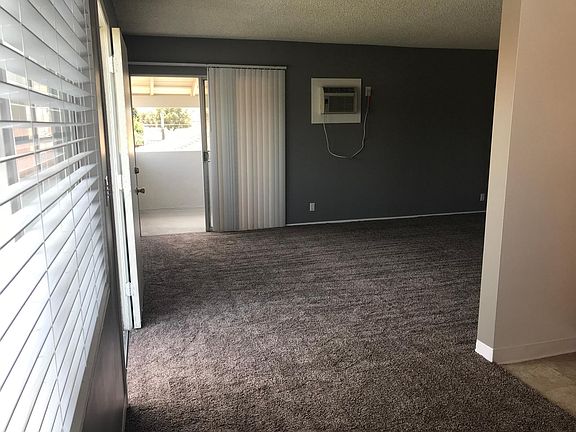 Dining Space to Living Room to Balcony