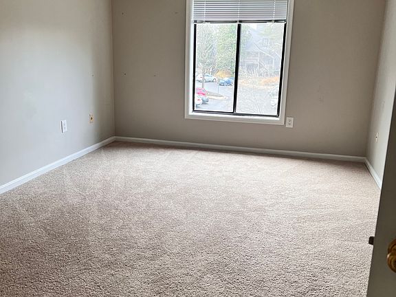 Master bedroom with walk-in closet /ceiling fan