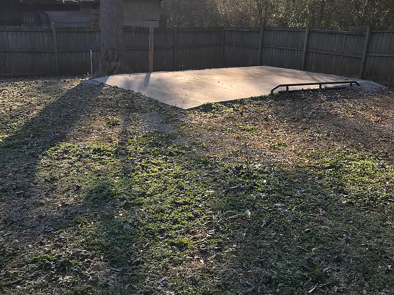 12 x 20 Cement Slab with 2 freeze free water hydrants and a waste drain