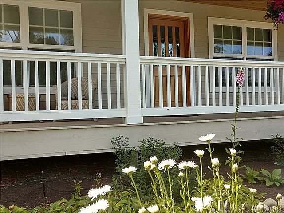 Lovely porch/perch for enjoying the days, overlooking your gardens and territorial view. 