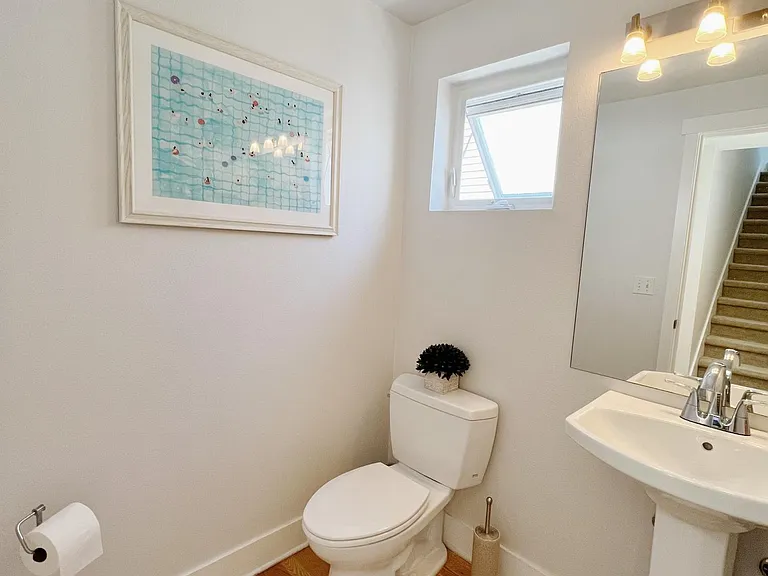 Remodeled powder room adjacent to living area