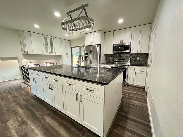 9387 W Eastman Pl — Photo 4