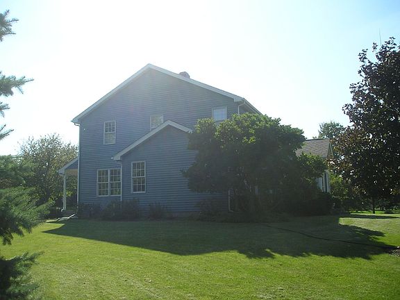 east end of house & family room from yard