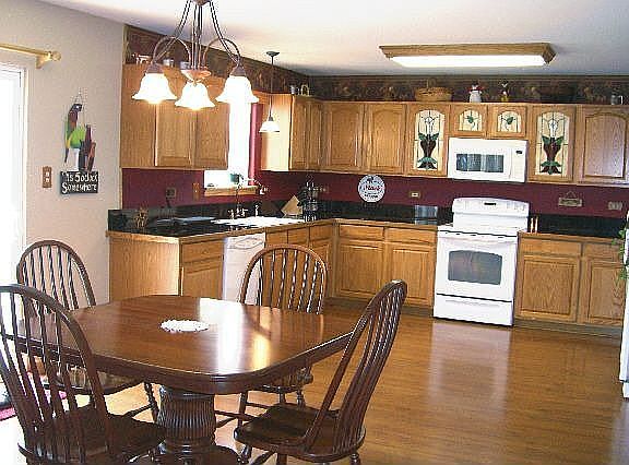 Huge Eat In Kitchen with Wood Floors!