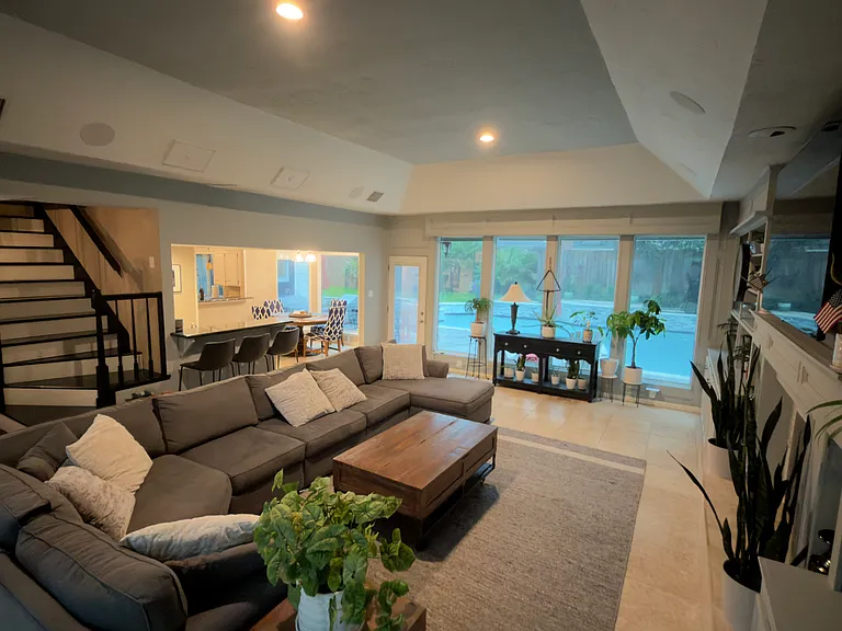 Stairs at the back of the living room