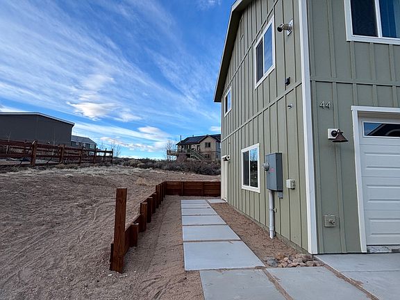 Pavers lead the way to the main entrance to the rental unit.