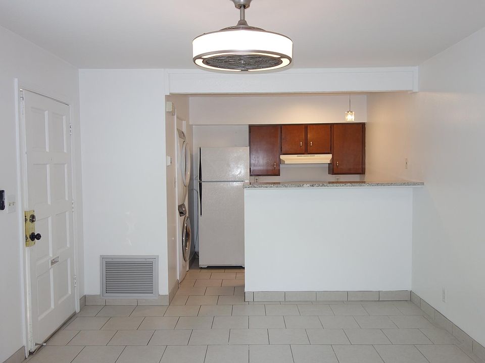 Tile throughout, with modern ceiling fan.