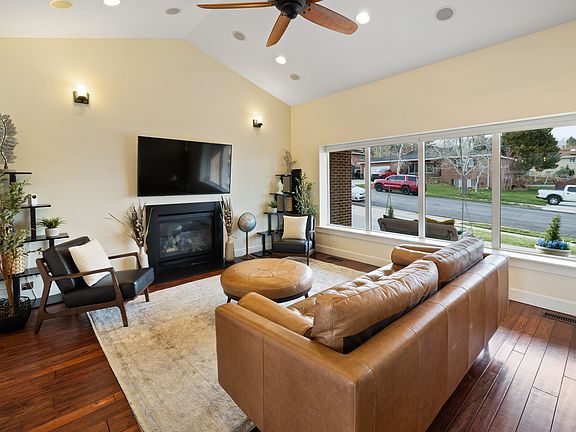 When you are sitting anywhere in this front room you get light from the bay windows pictured and light from the windows in the dining area/kitchen. If you love natural light you'll love this home.