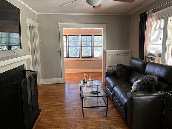 Living room to light and airy Sun room/ bonus room