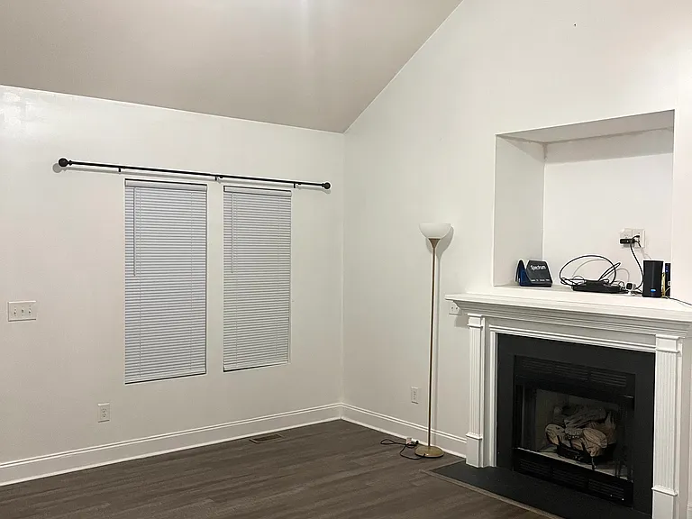 Living room with vaulted ceilings.