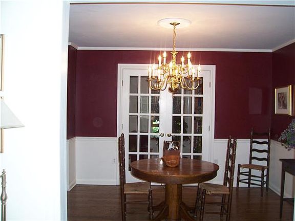Dining room has French Doors to 3 Season Room