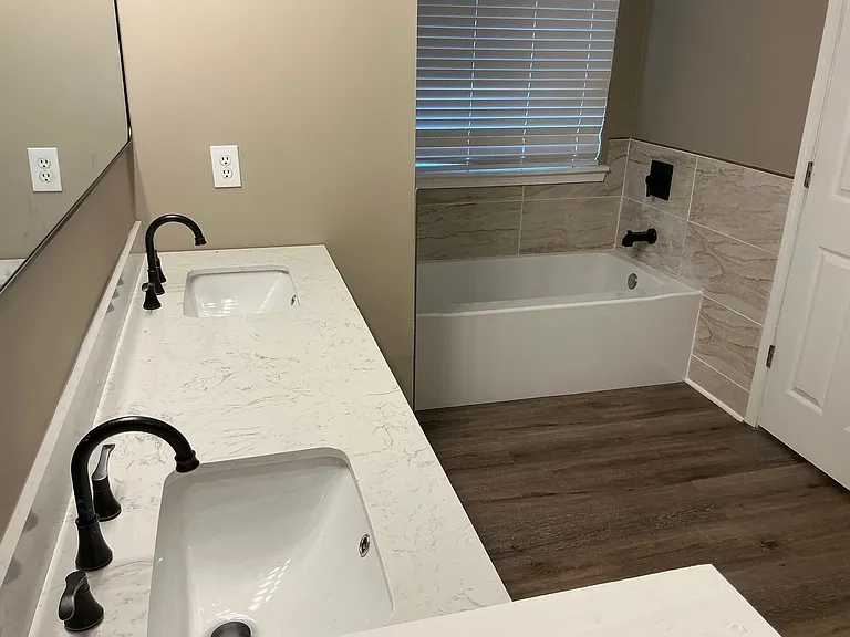 Dual Vanity and Built-In Soaker Tub