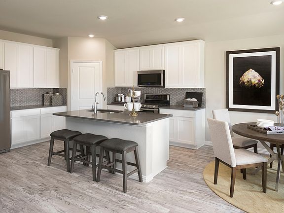 Cook delicious meals in the gourmet kitchen.