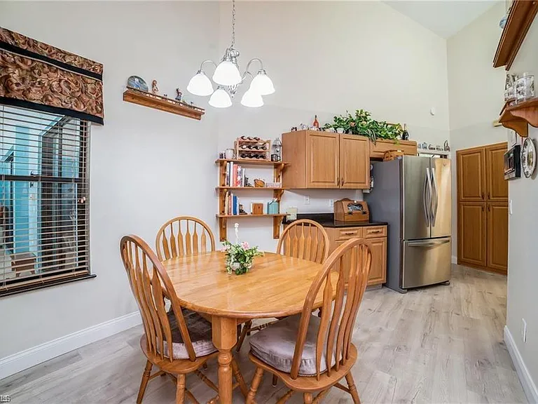 5980 Hidden Oaks Ln — Photo 7